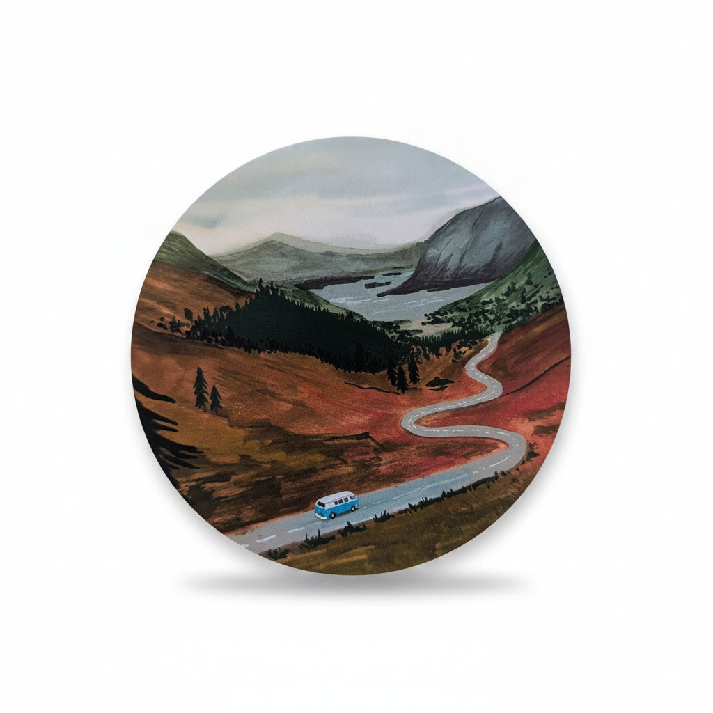 Close-up of the Up the Highlands vinyl sticker showing a scenic gouache illustration of a camper van driving along a winding road through the Scottish Highlands.