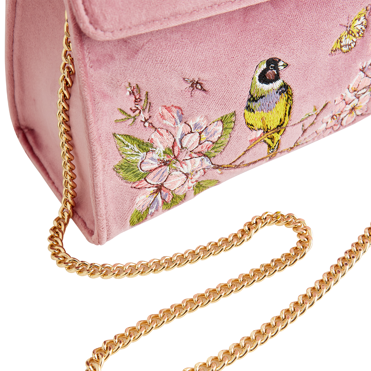 Pink velvet tote detail with draped gold chain strap