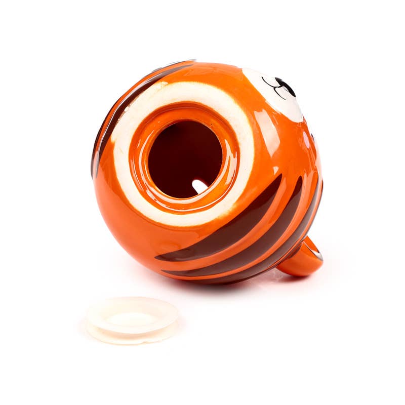 Underside view of Alfie the Tiger money box showing coin slot and removable rubber bung.