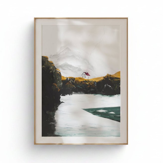 Framed artwork of a mountain landscape with a lake on a beige wall.