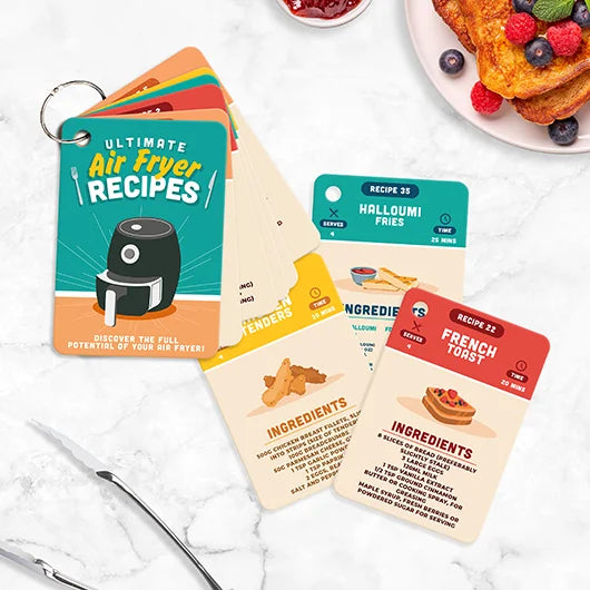 Air fryer recipe cards on metal ring binder showing ingredients