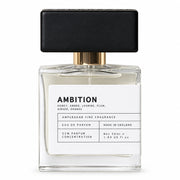 Ambition eau de parfum bottle with black cap, front view on cream background