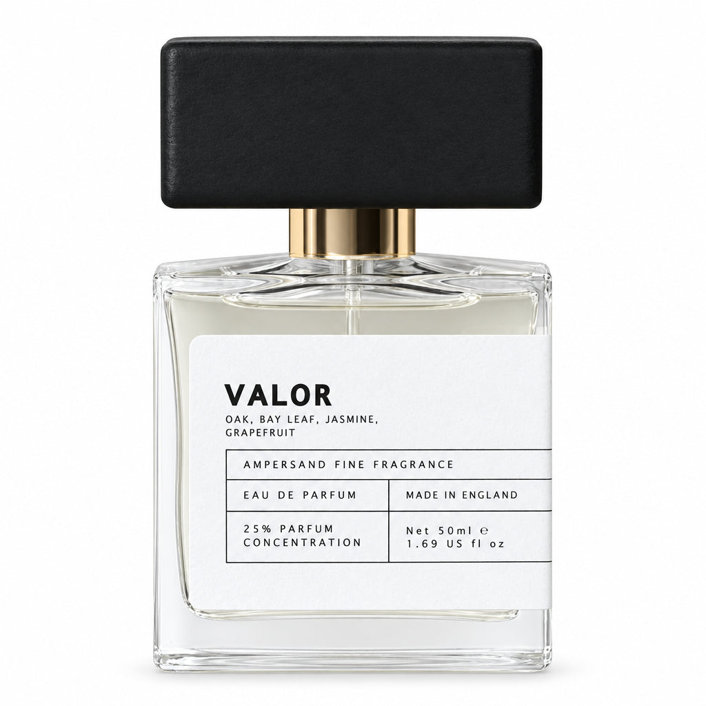 Valor eau de parfum bottle with black cap, front view on cream background