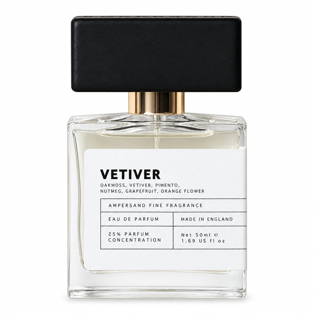 Vetiver eau de parfum bottle with black cap, front view on cream background
