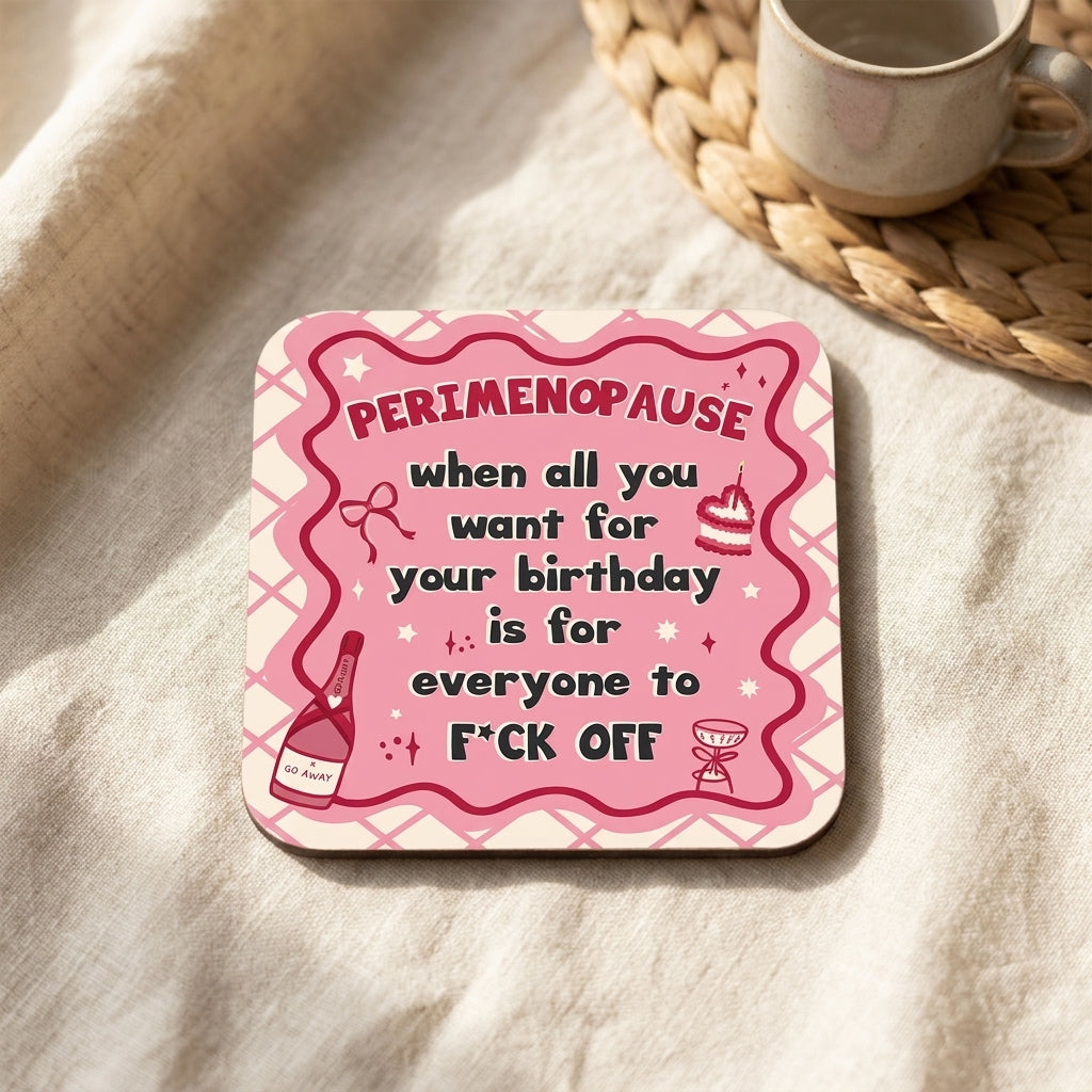 'Perimenopause Birthday' cork coaster, Art Wow styled in a warm lifestyle setting