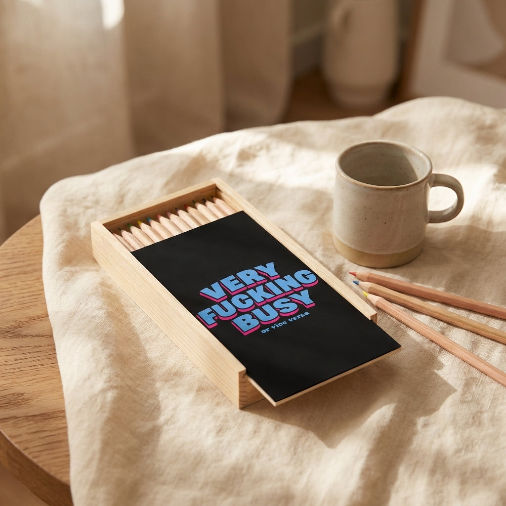 'Very Fucking Busy' by Lilly Rose coloured pencils set with box, Art Wow styled in a warm lifestyle setting