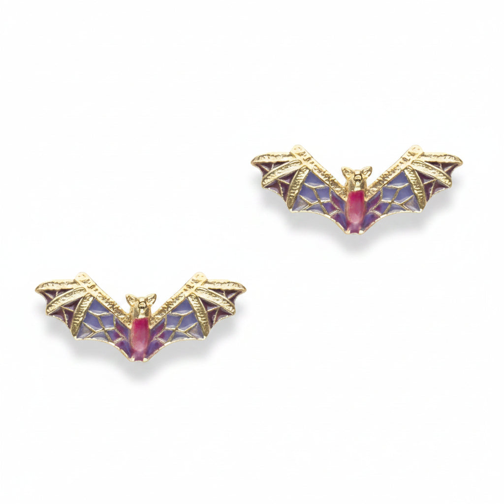 Purple and gold enamel bat stud earrings on white background