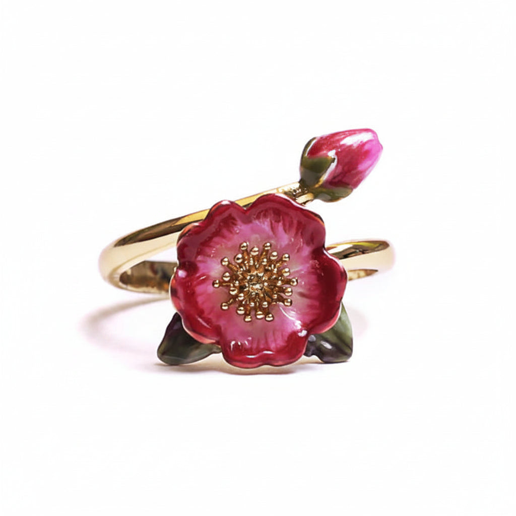 Bill Skinner Wild Flower Open Ring with hand-painted pink enamel flower and bud on gold band against white background.