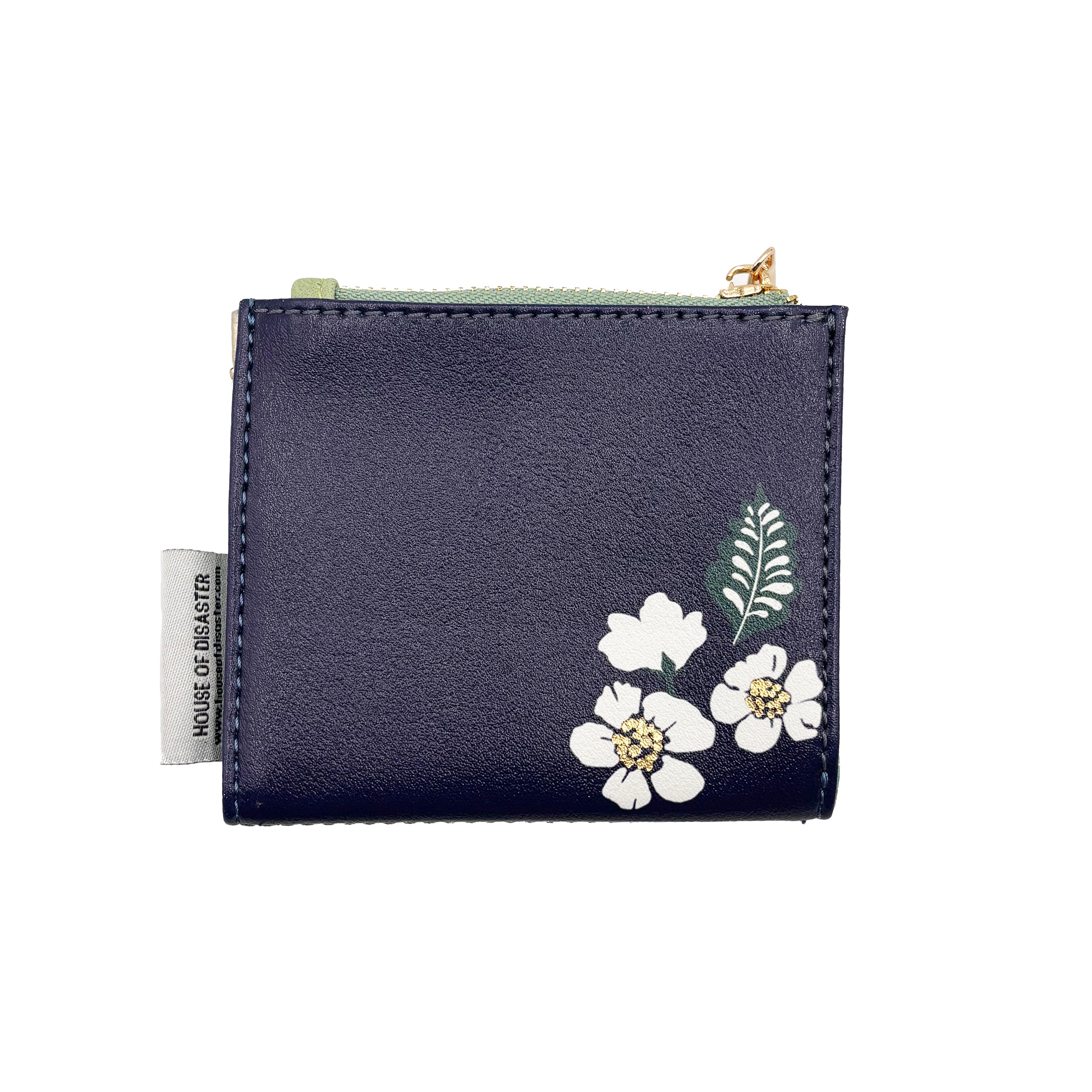 Back of bird purse with floral design on faux leather