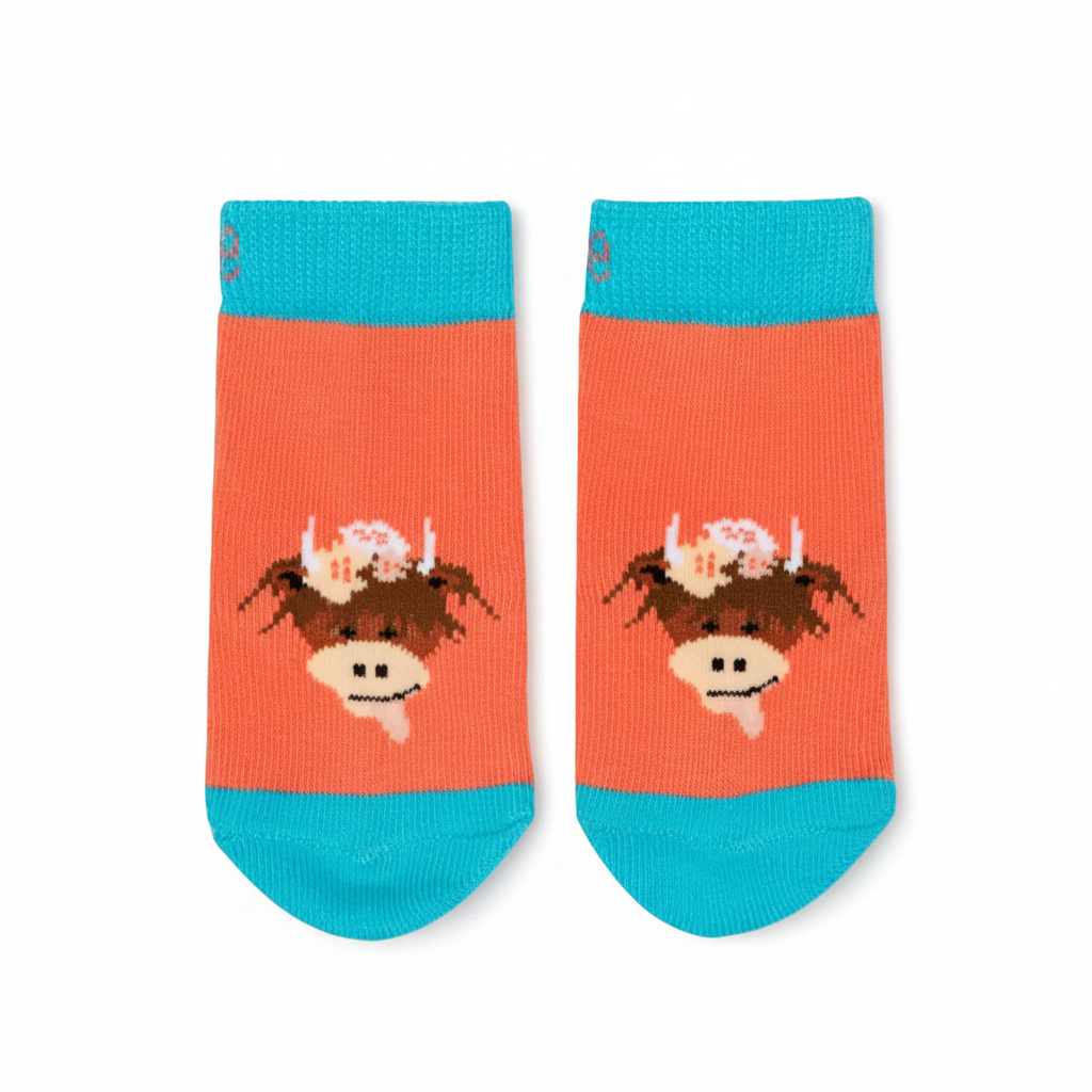 Coral Bonnie highland cow socks second view on pastel background