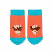 Coral Bonnie highland cow socks second view on pastel background