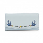 Light blue foldover purse with embroidered birds and floral garland.