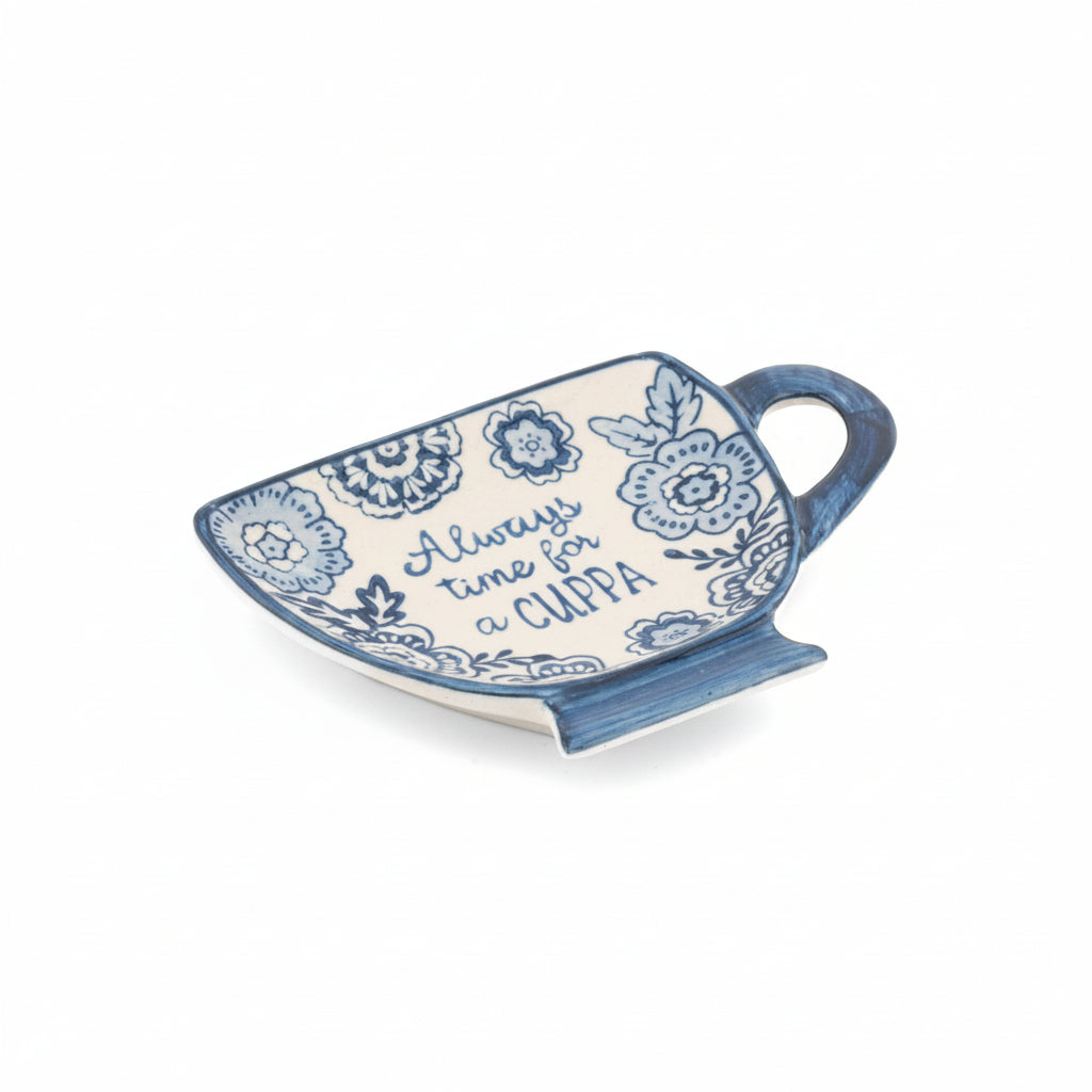 Close up detail of blue willow pattern on ceramic teabag dish