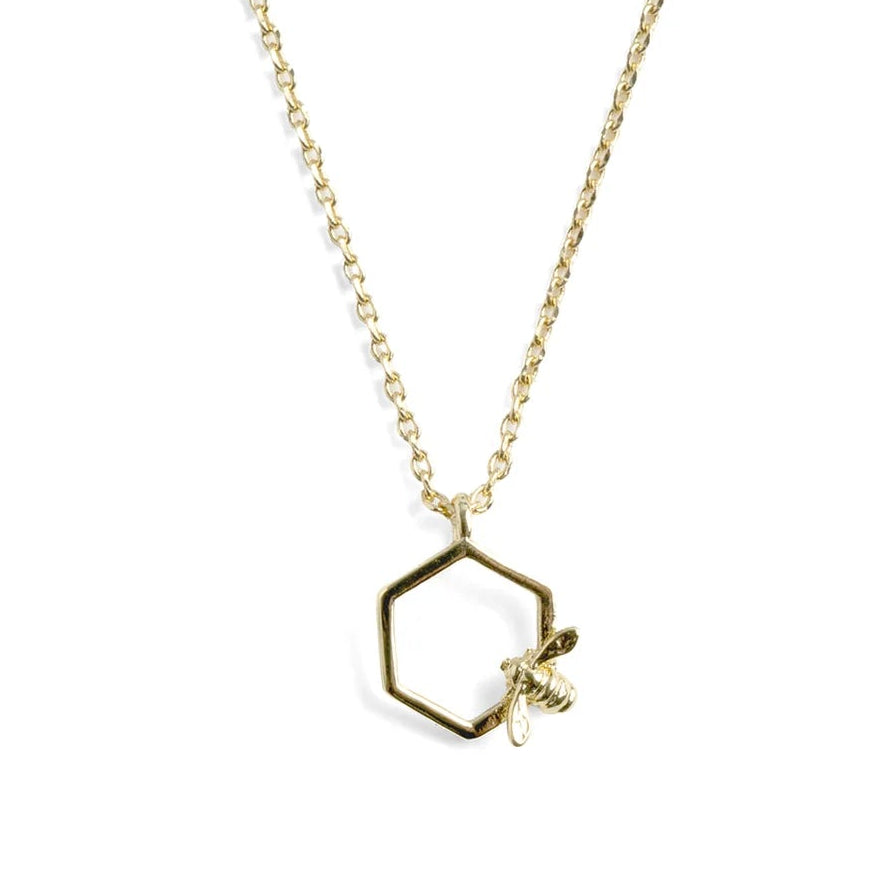 Bill Skinner Bumble Bee Hex Pendant featuring a gold-plated bee resting on a hexagonal frame necklace.