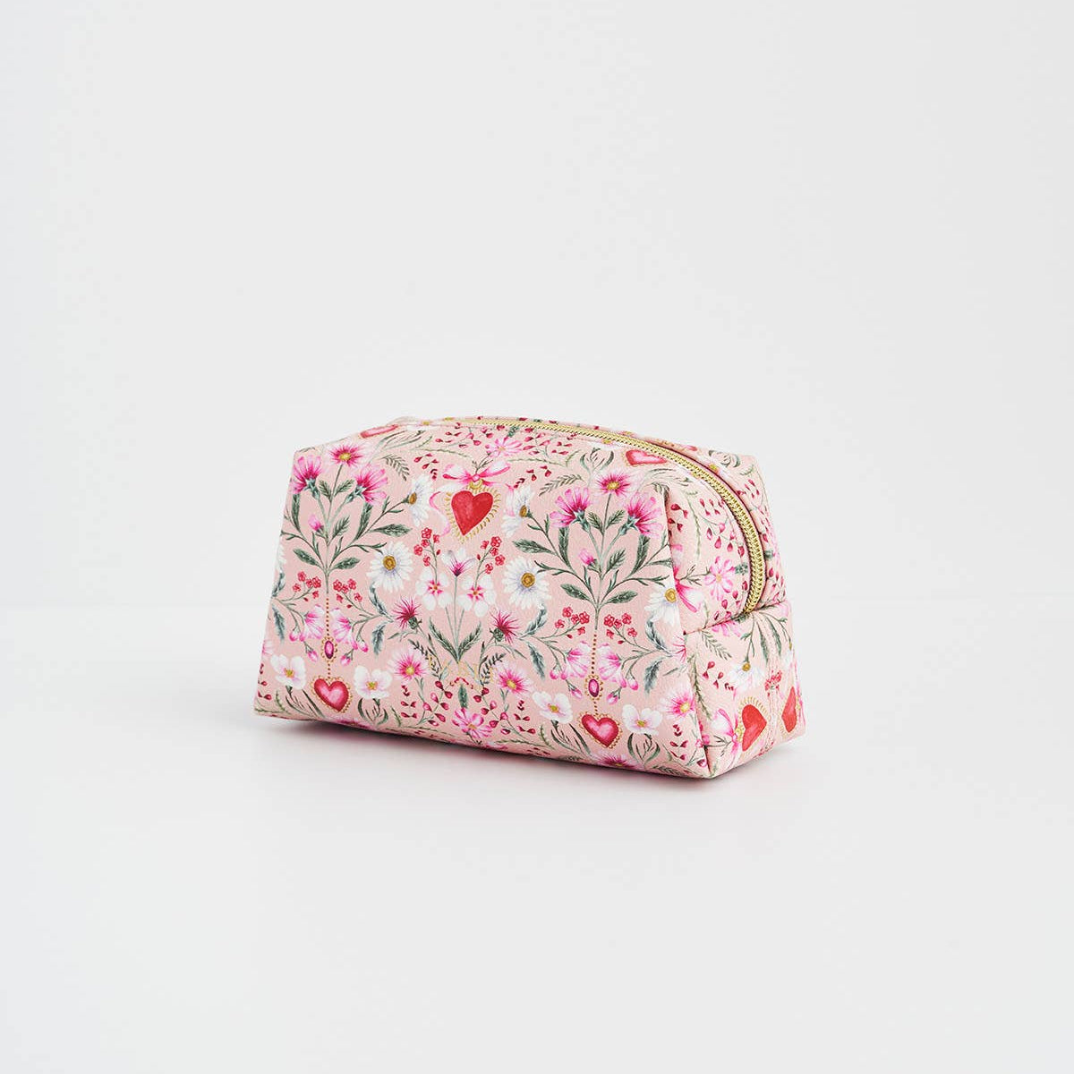 Side view of the pink pouch showing its boxy depth