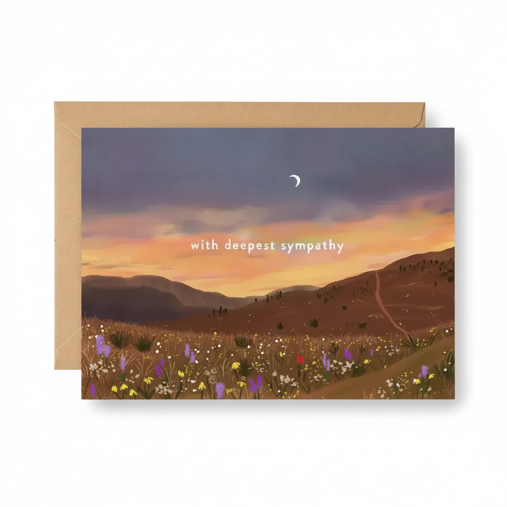 Greeting card with a sunset over a field and 'with deepest sympathy' text.
