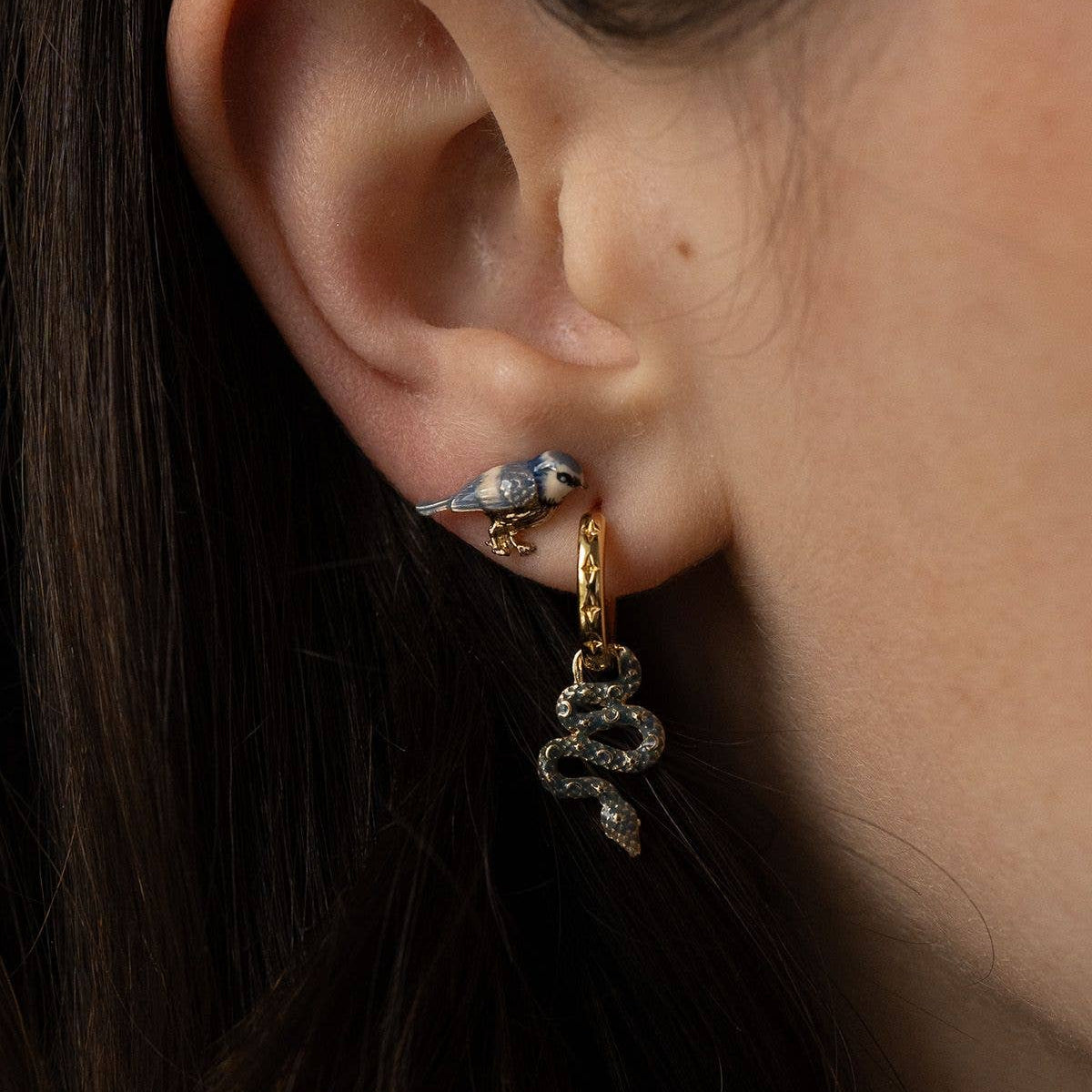 Fable England blue tit stud earrings, angled view showing enamel colours