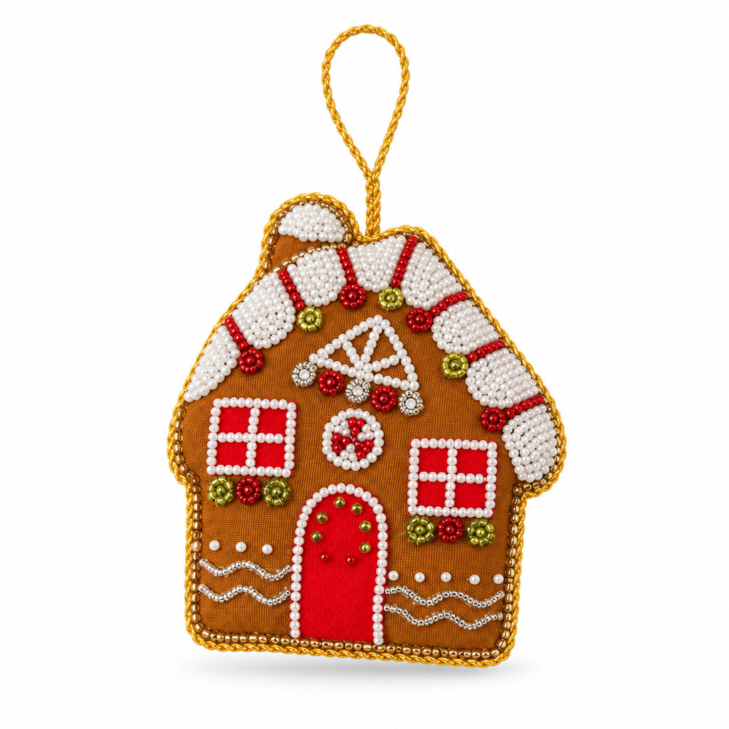 Gingerbread House embroidered decoration close up, showing the beaded icing and red door