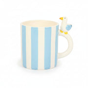 Blue and white striped mug with perched seagull handle on white background