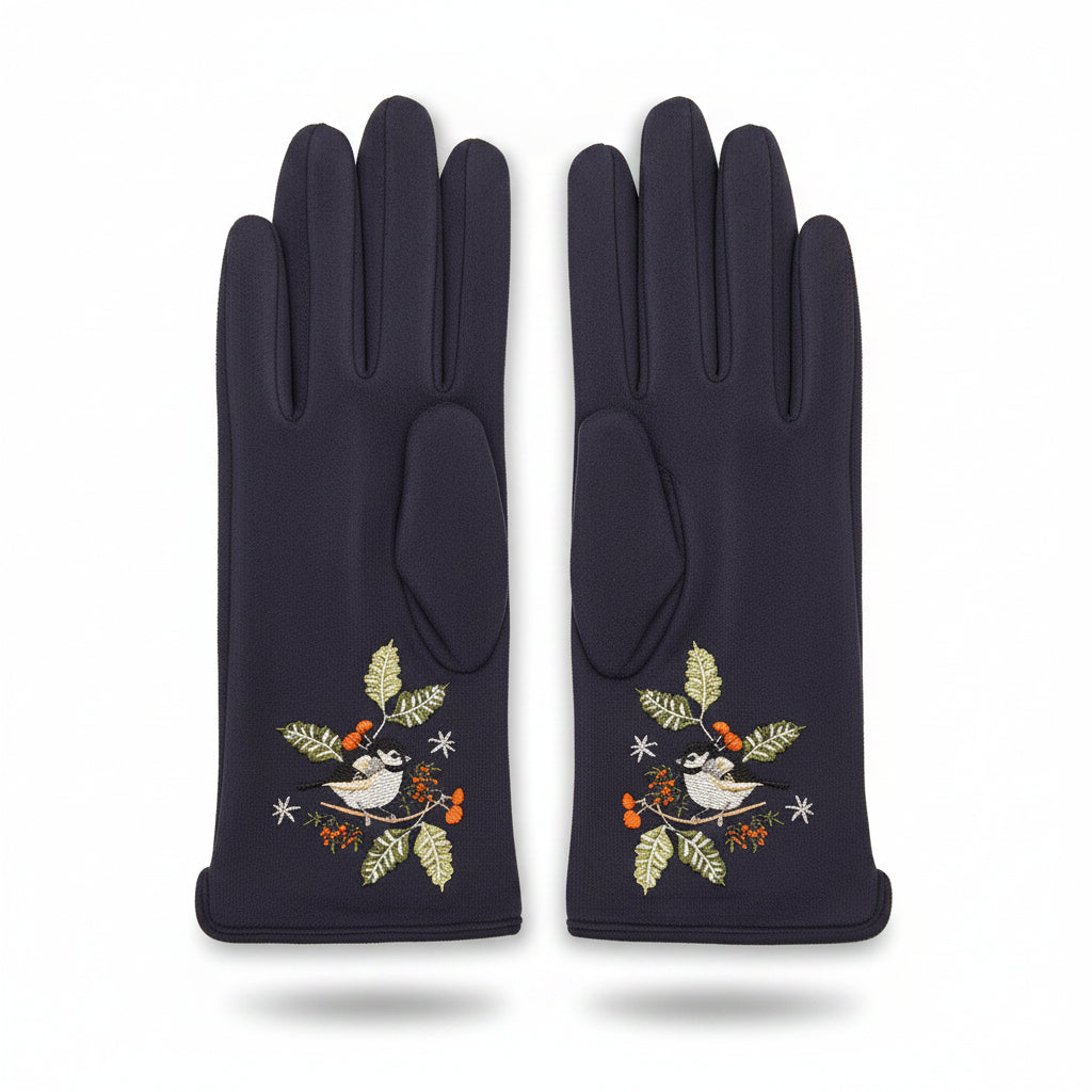 Single navy bird glove angled showing embroidery on pink background