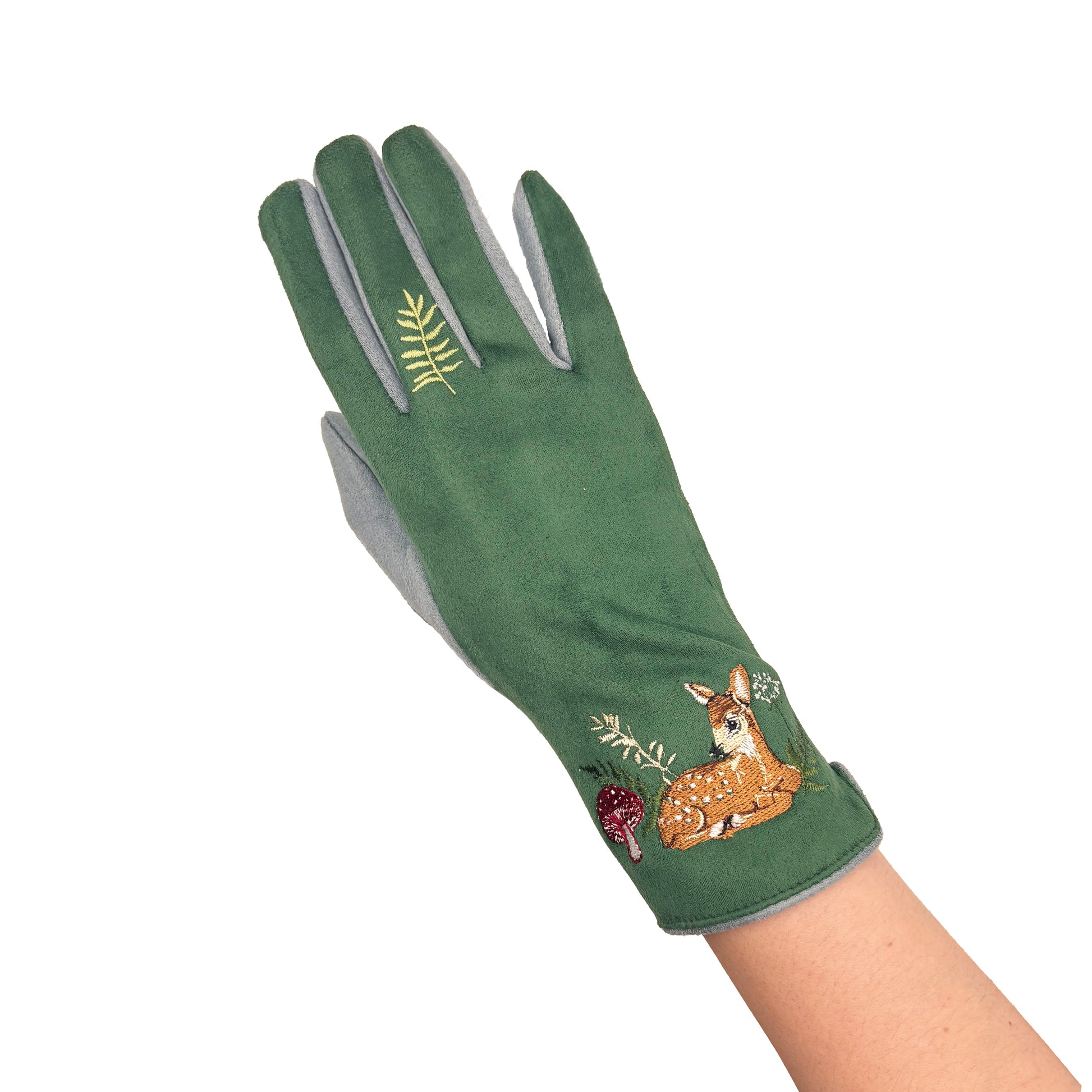 Single green deer glove worn on hand showing embroidery on white background