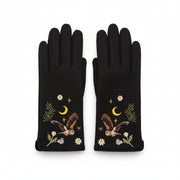 Black owl gloves pair front view on white background
