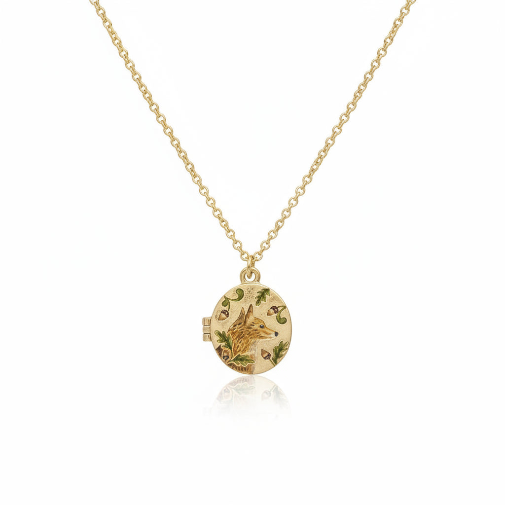 Fox and Acorn gold locket necklace closed on chain - angled view