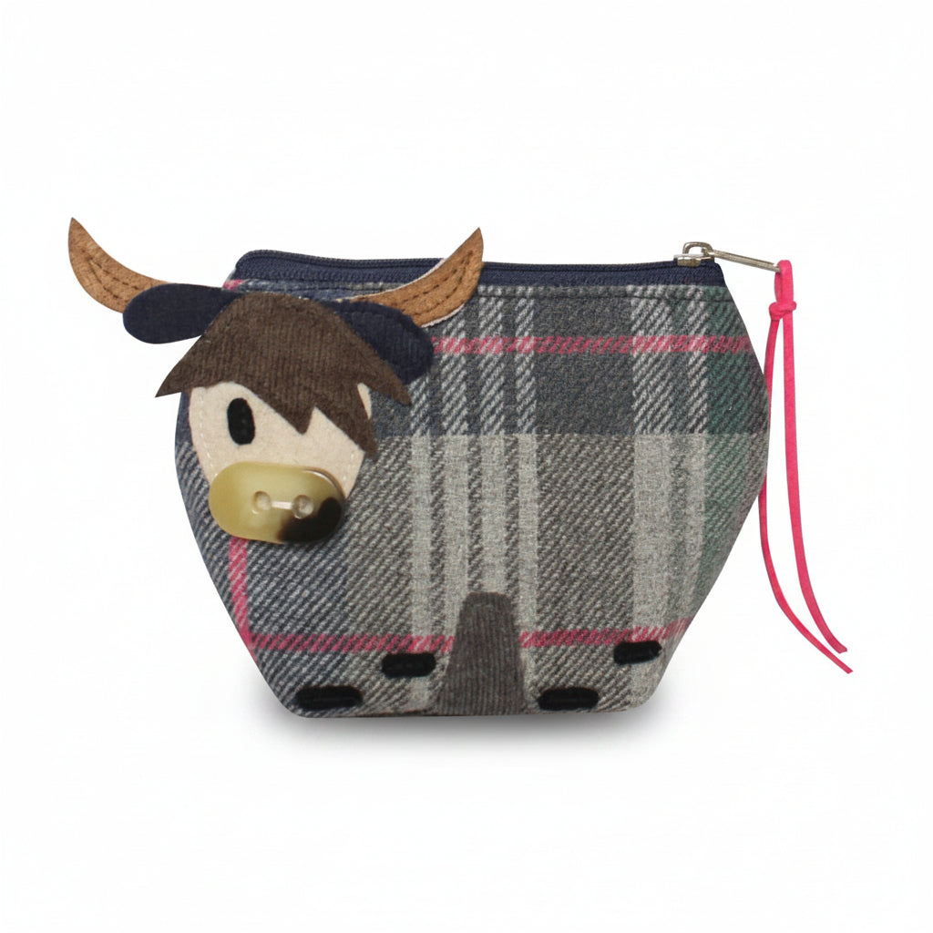 Drem tweed cow purse side view showing herringbone pattern