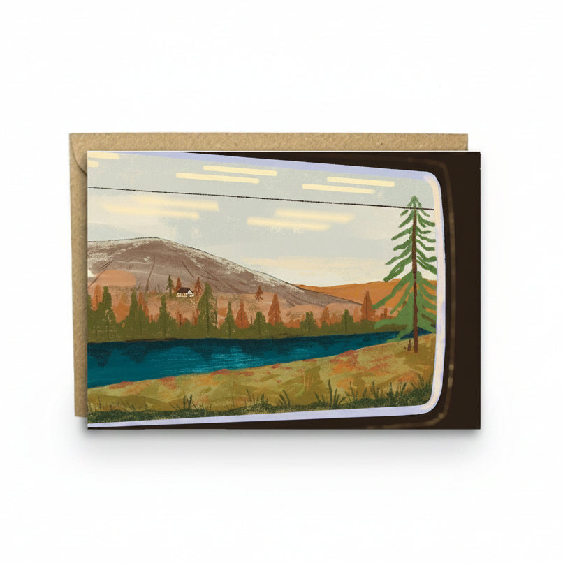 Illustrated greetings card showing a view through a train window.