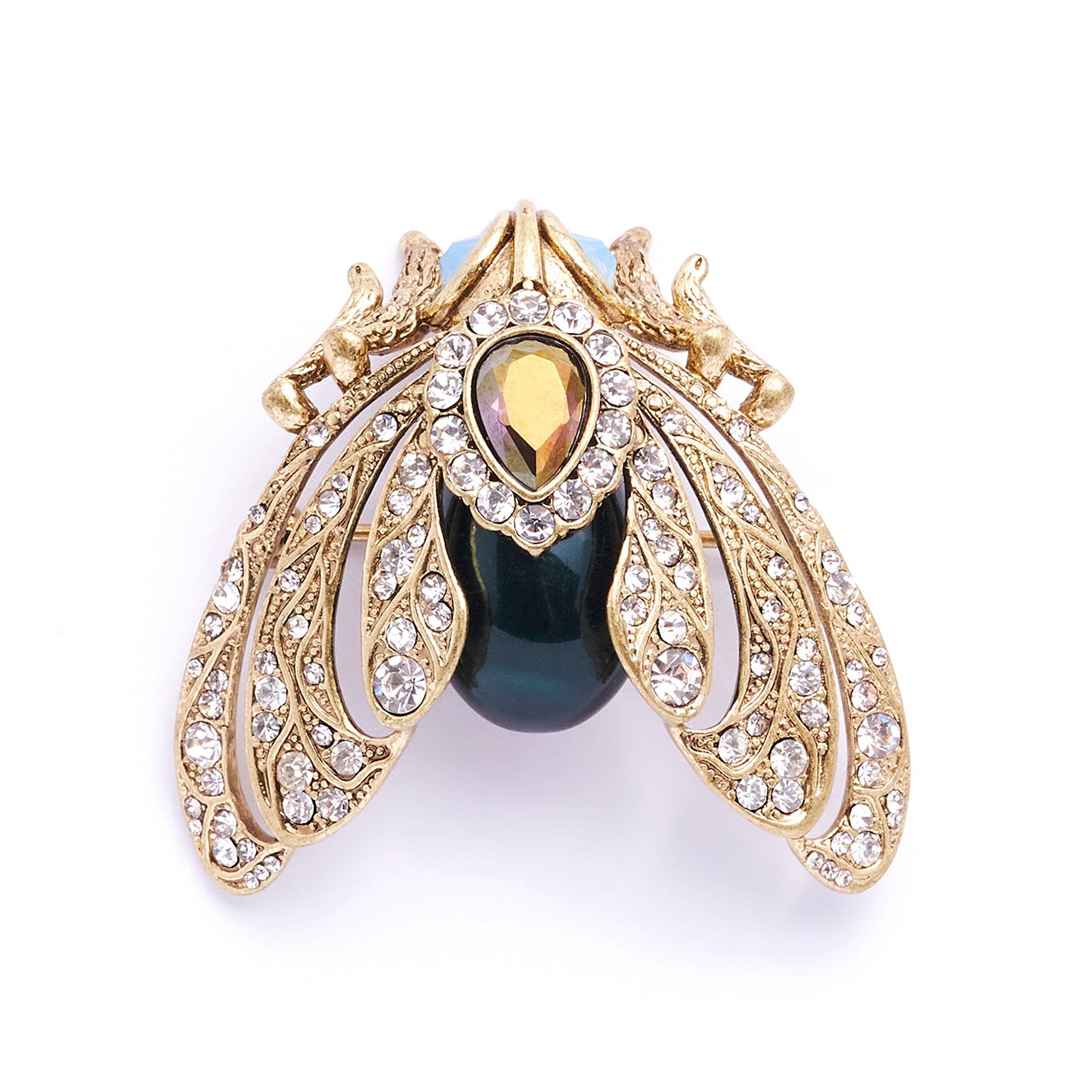 Bejewelled Moth Brooch by Bill Skinner with gold plating, crystals, and antique finish on white background.