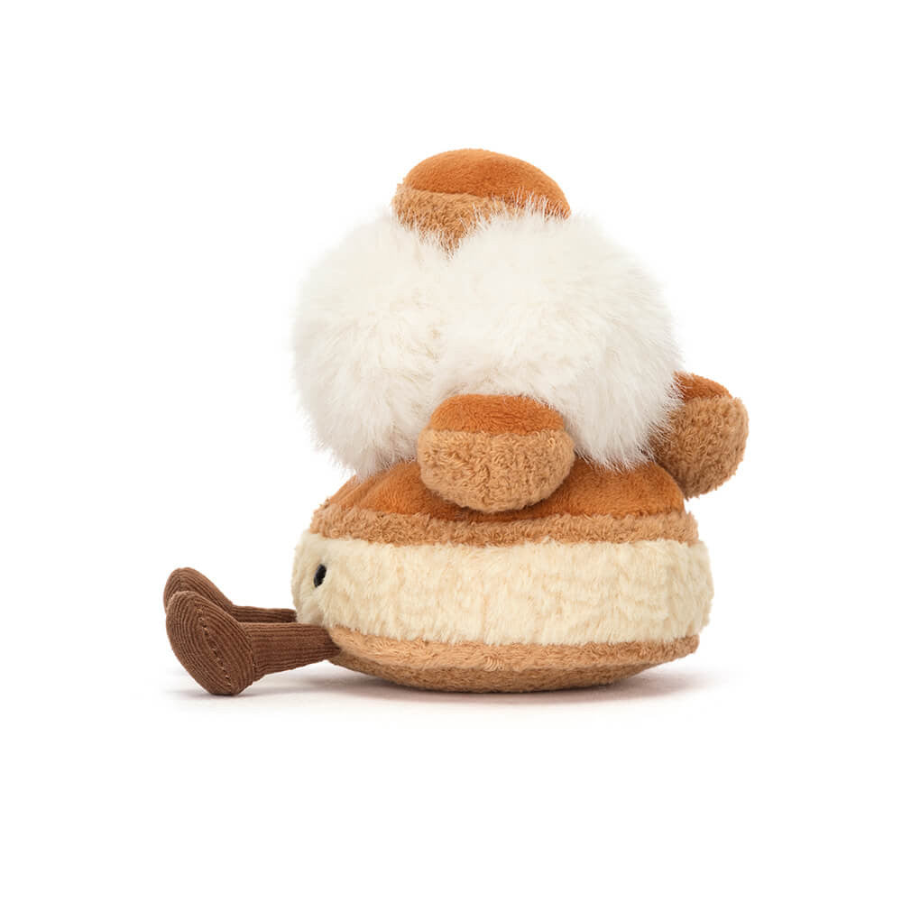 Jellycat Mirielle St Honore plush with cream pom hat mid-stride