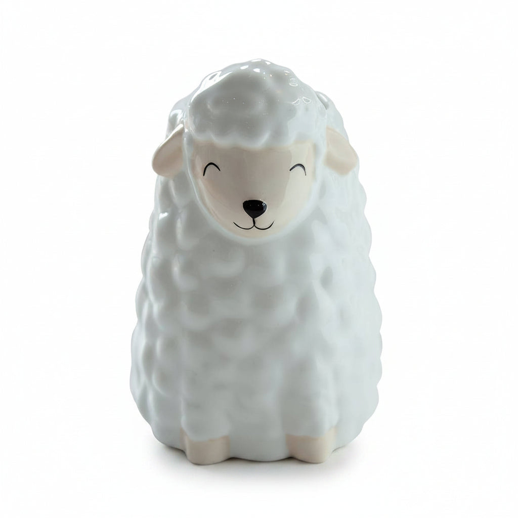 White ceramic sheep small vase with cute face on white background