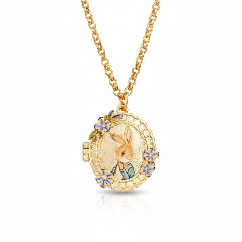 Peter Rabbit cameo locket close-up showing hand-painted enamel detail on white background