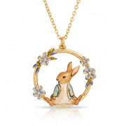 Peter Rabbit forget-me-not pendant close-up showing enamel detail on white background