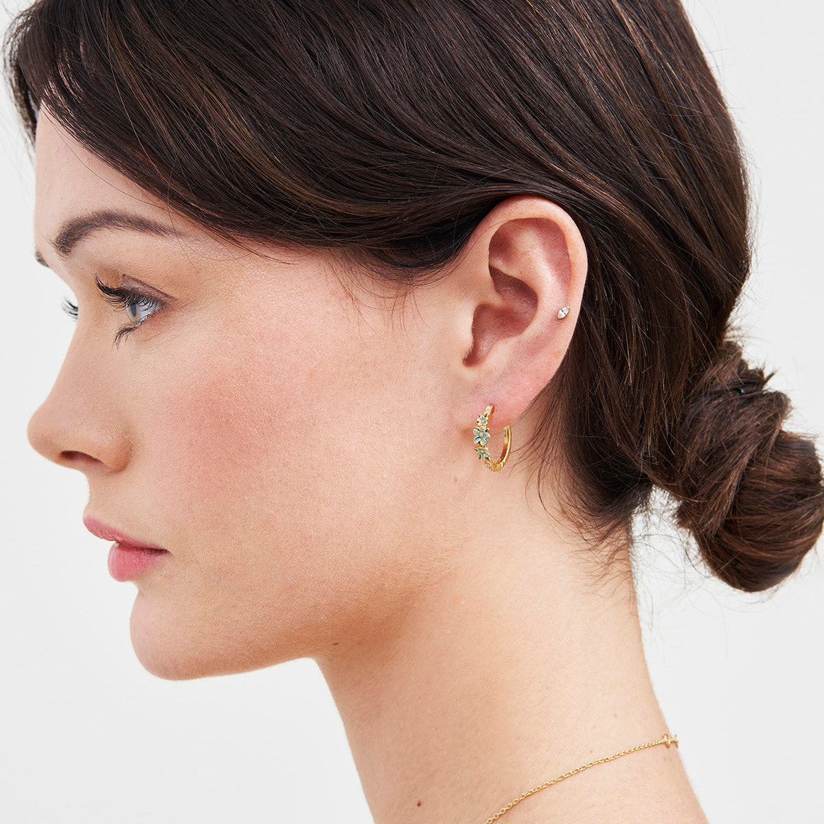 Model wearing the Floral Wreath Hoop Earrings