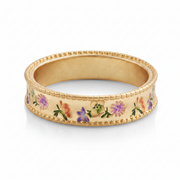 Close-up detail of the Folksy Floral Gold Ring on white