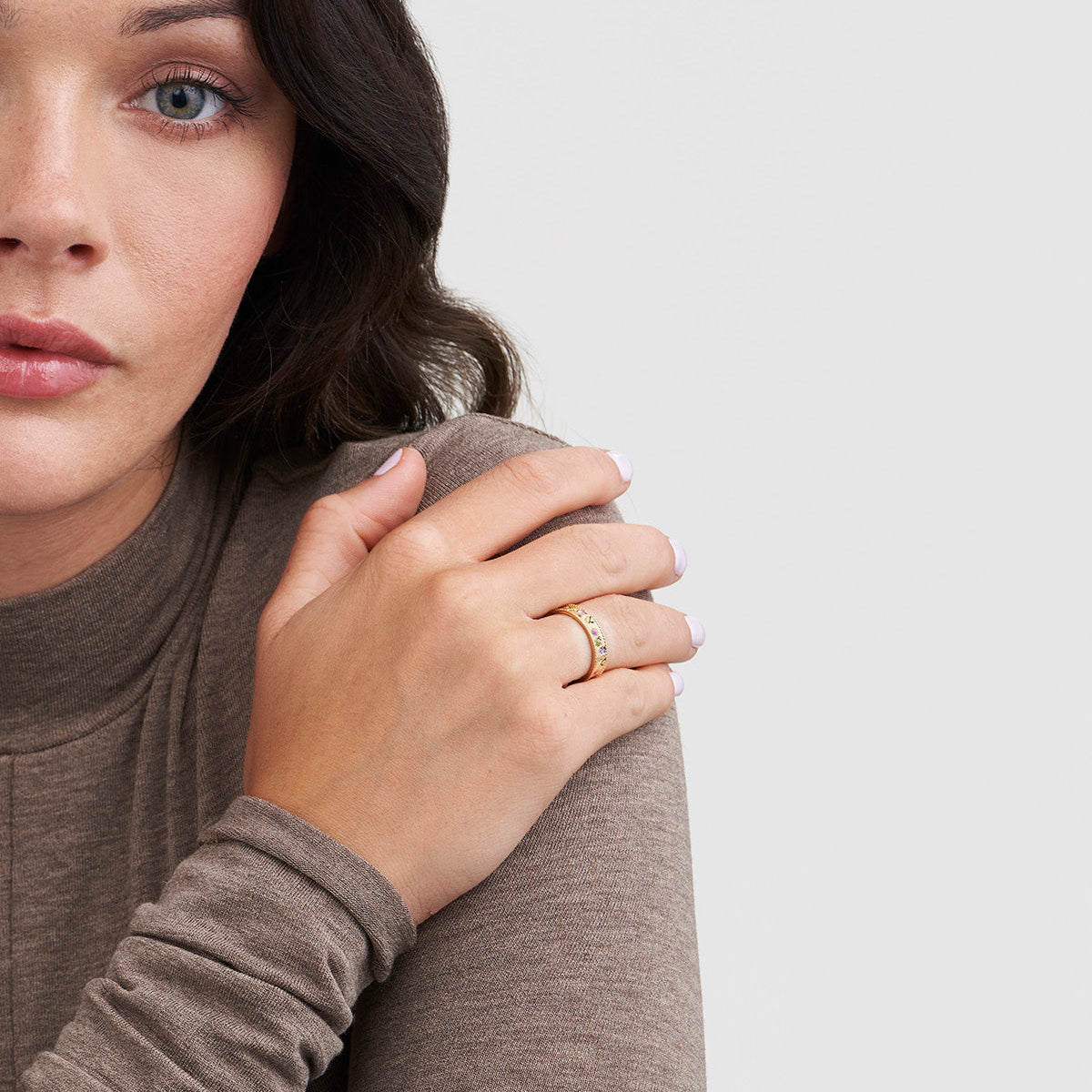 Model wearing the Folksy Floral Gold Ring