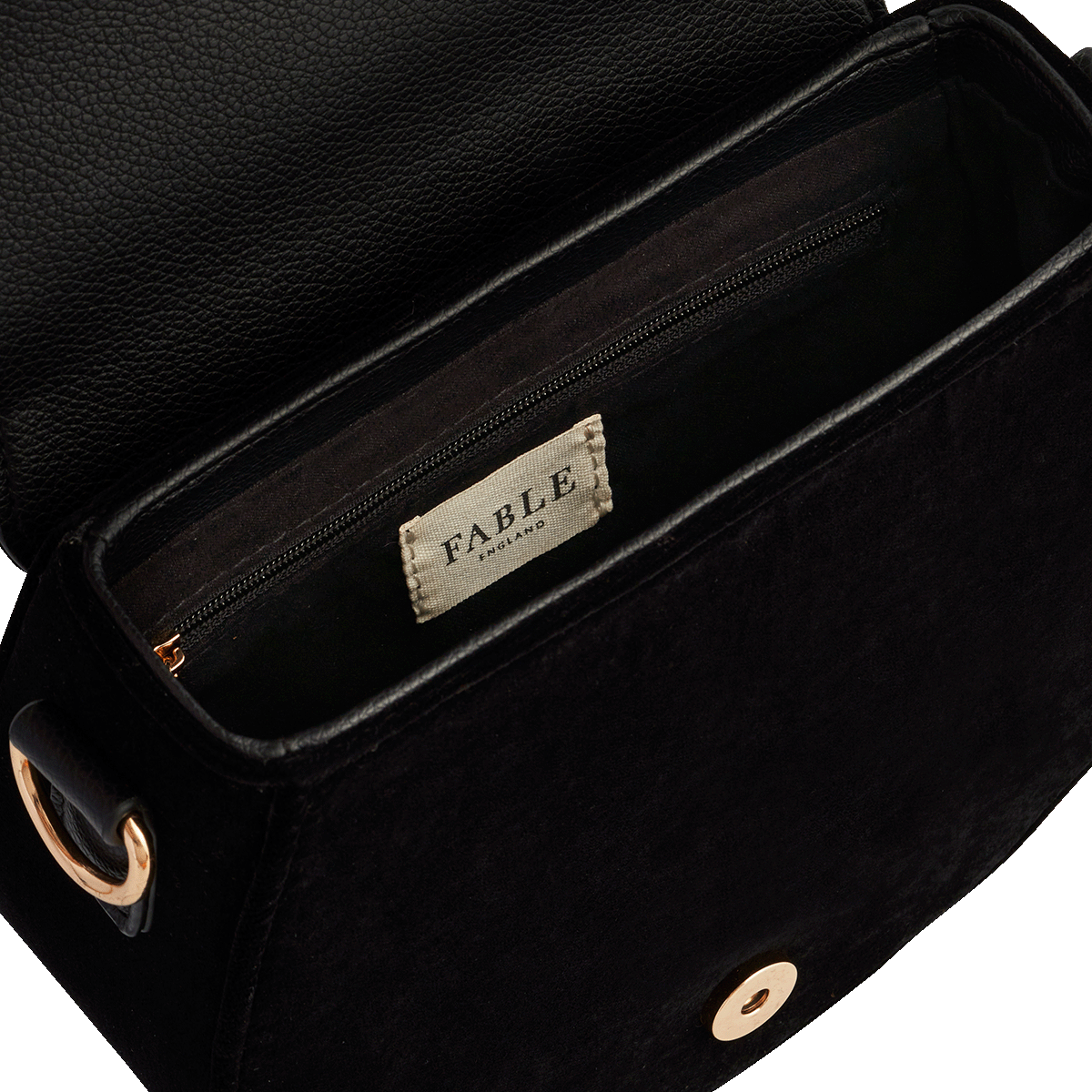Inside of the Fox & Owl Embroidered Black Saddle Bag showing the lined pocket