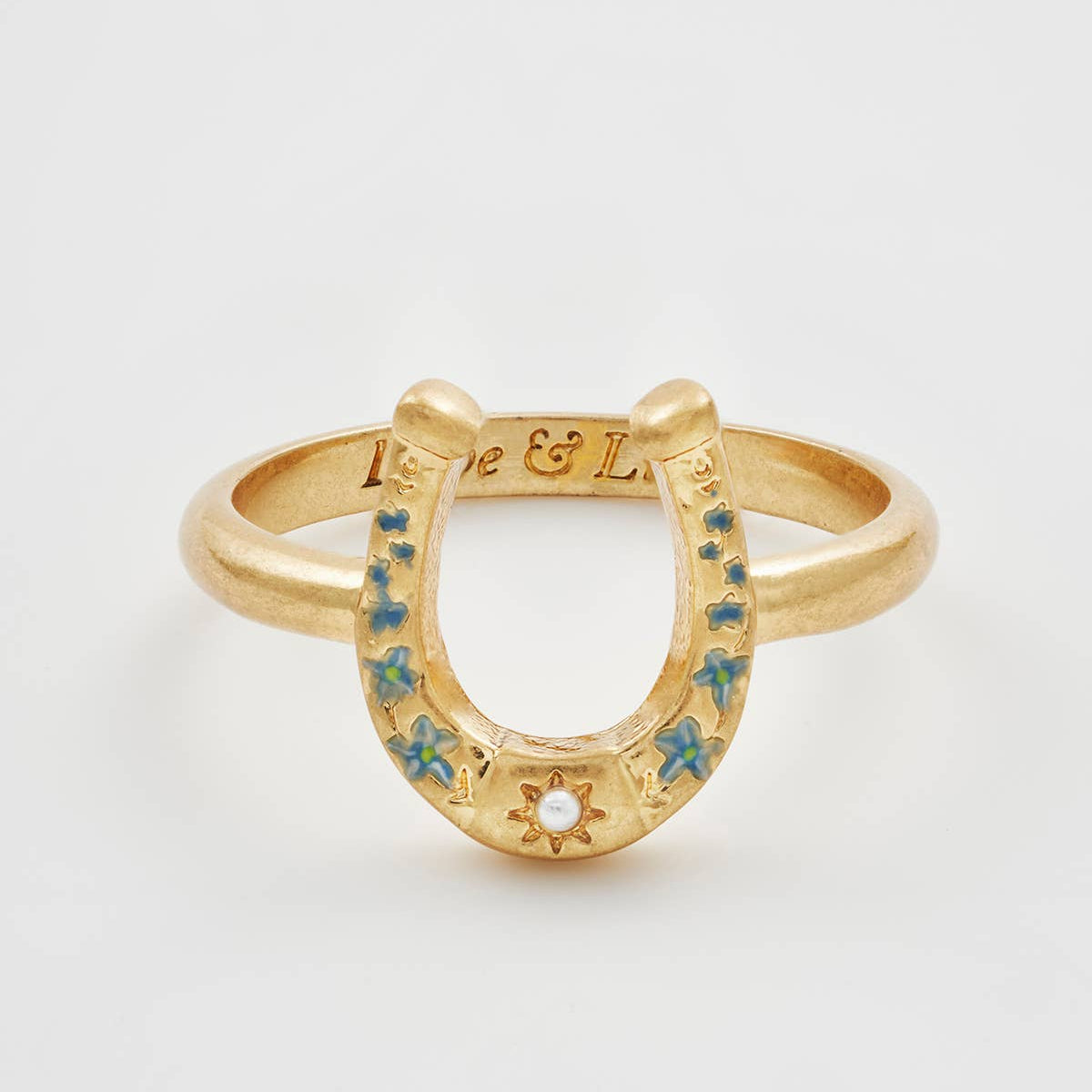 Horseshoe ring front view on white background showing enamel florals