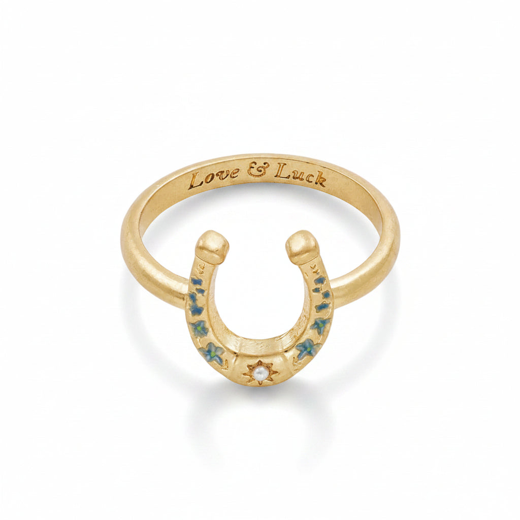 Horseshoe ring showing Love and Luck engraving inside band
