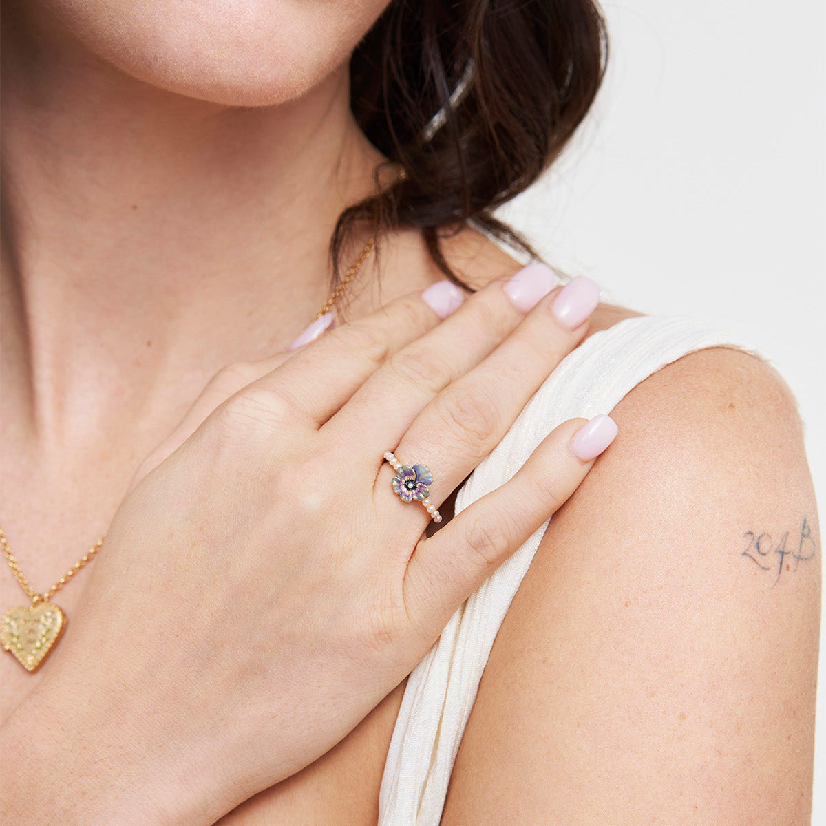 Model wearing the Pansy Pearl Ring