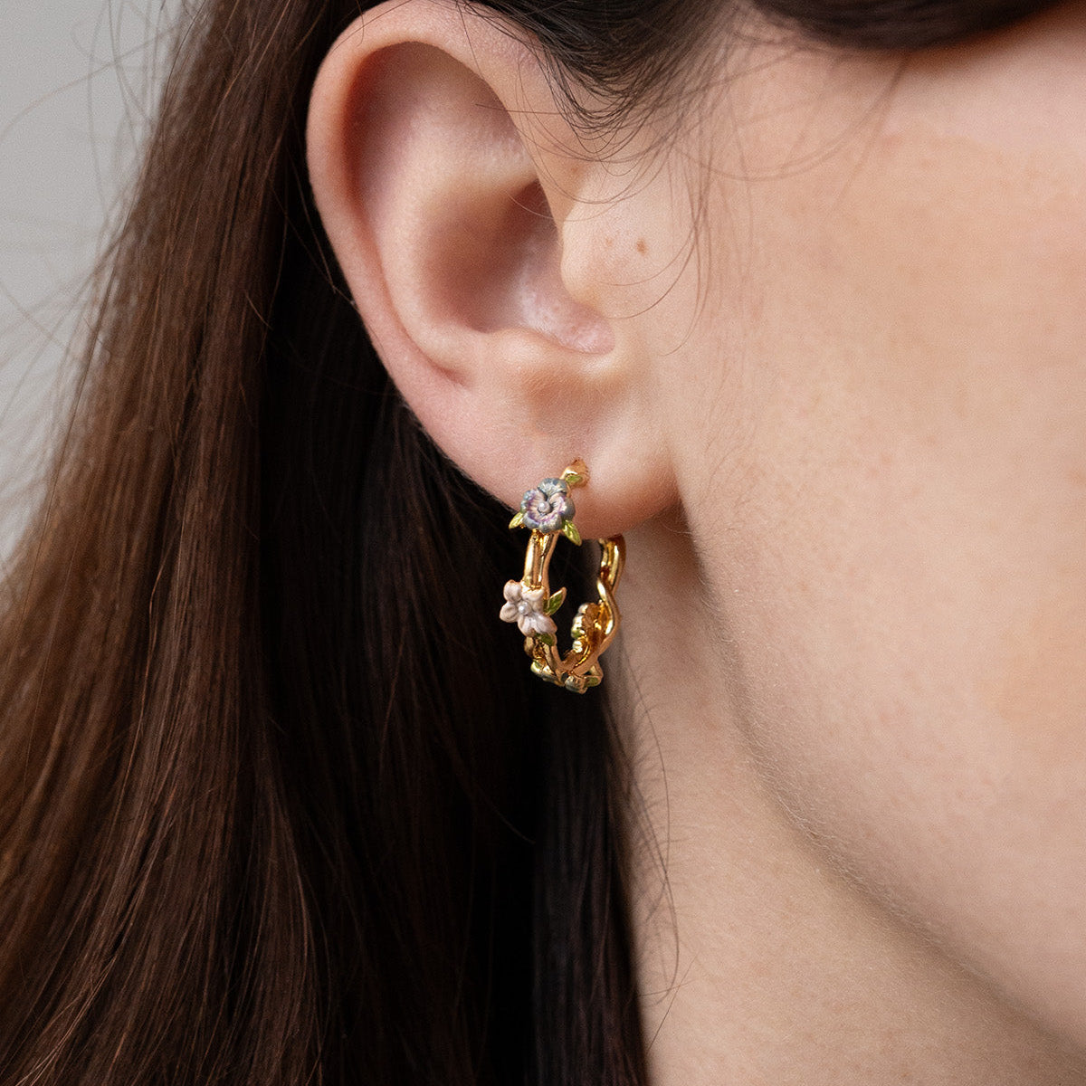 Model wearing the Wildflower Garden Hoop Earrings, close view