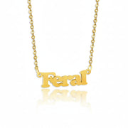 Gold feral necklace displayed flat on white background