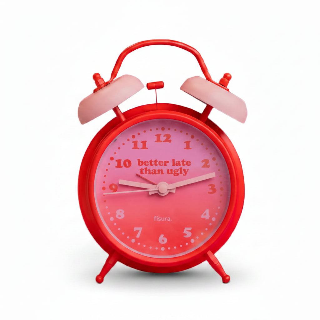 Red twin-bell alarm clock with pink dial shown beside its gift box