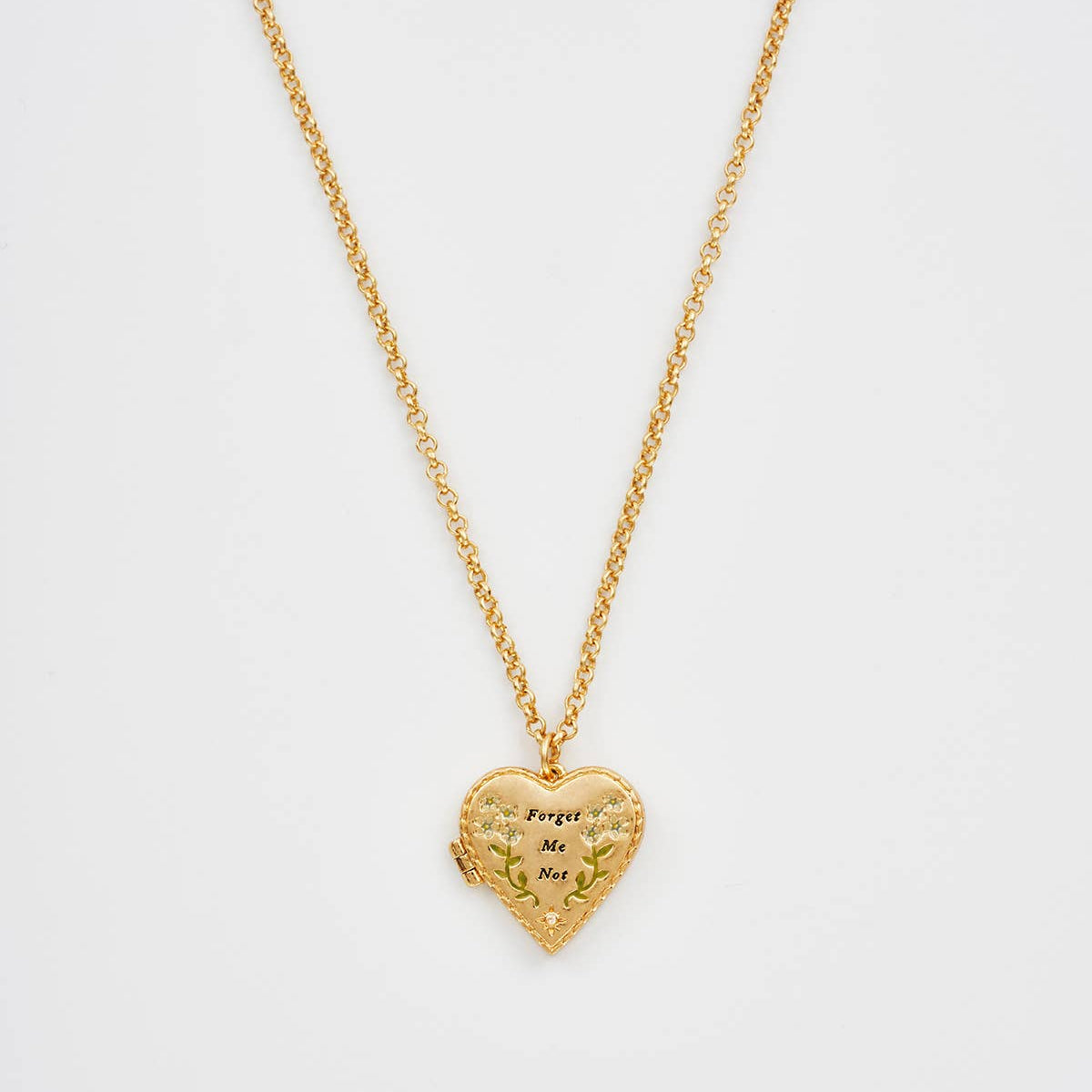 Floral heart gold locket necklace with forget-me-not enamel on white background.