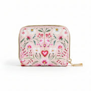 Front view of the floral heart pink purse on a white background.