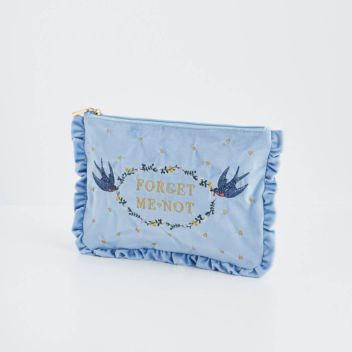 Forget Me Not blue velvet embroidered pouch on white background