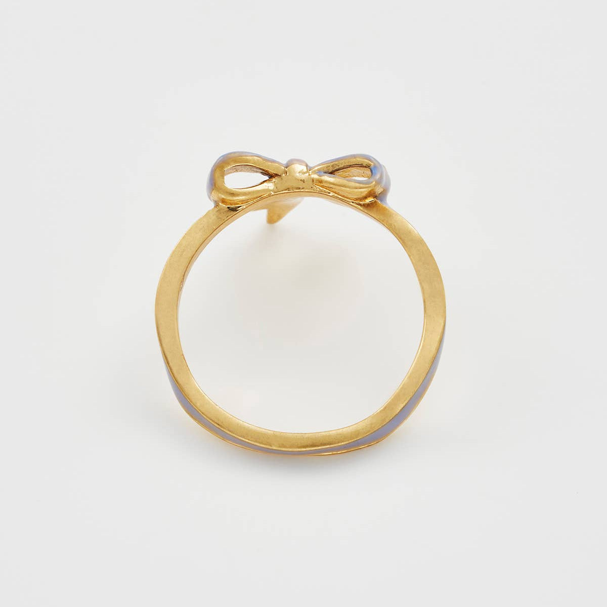 Back view of gold Forget-Me-Not bow ring on white background.