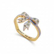 Forget-Me-Not bow ring in gold with blue enamel on white background.