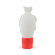 Soy sauce fish light with its red cap beside the retail packaging
